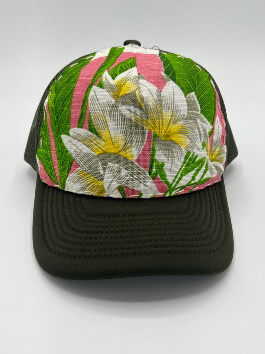 Bagshaws of Saint Lucia vibrant plumeria vintage fabric- army green curved brim trucker hat