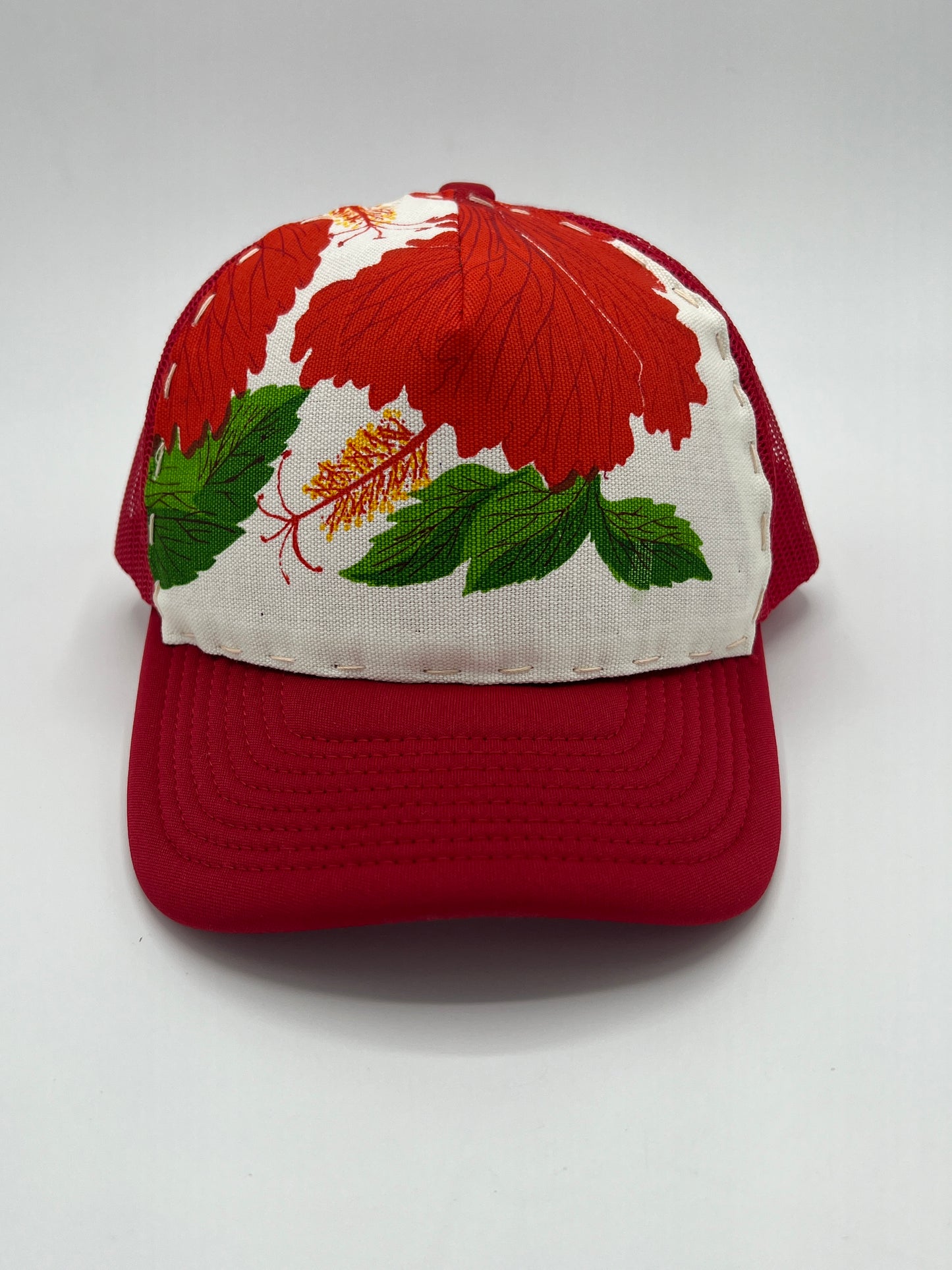 Bagshaws of Saint Lucia vibrant vintage fabric- red curved brim trucker hat