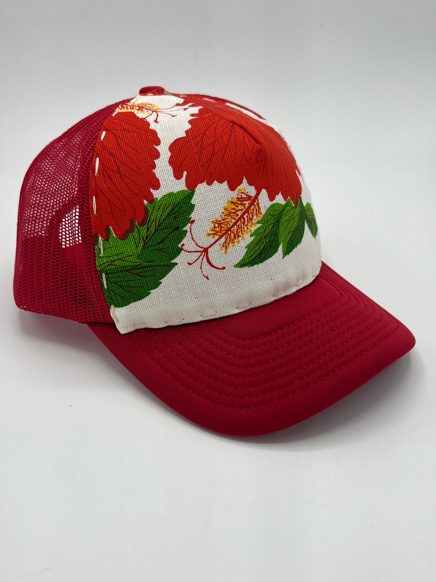 Bagshaws of Saint Lucia vibrant vintage fabric- red curved brim trucker hat