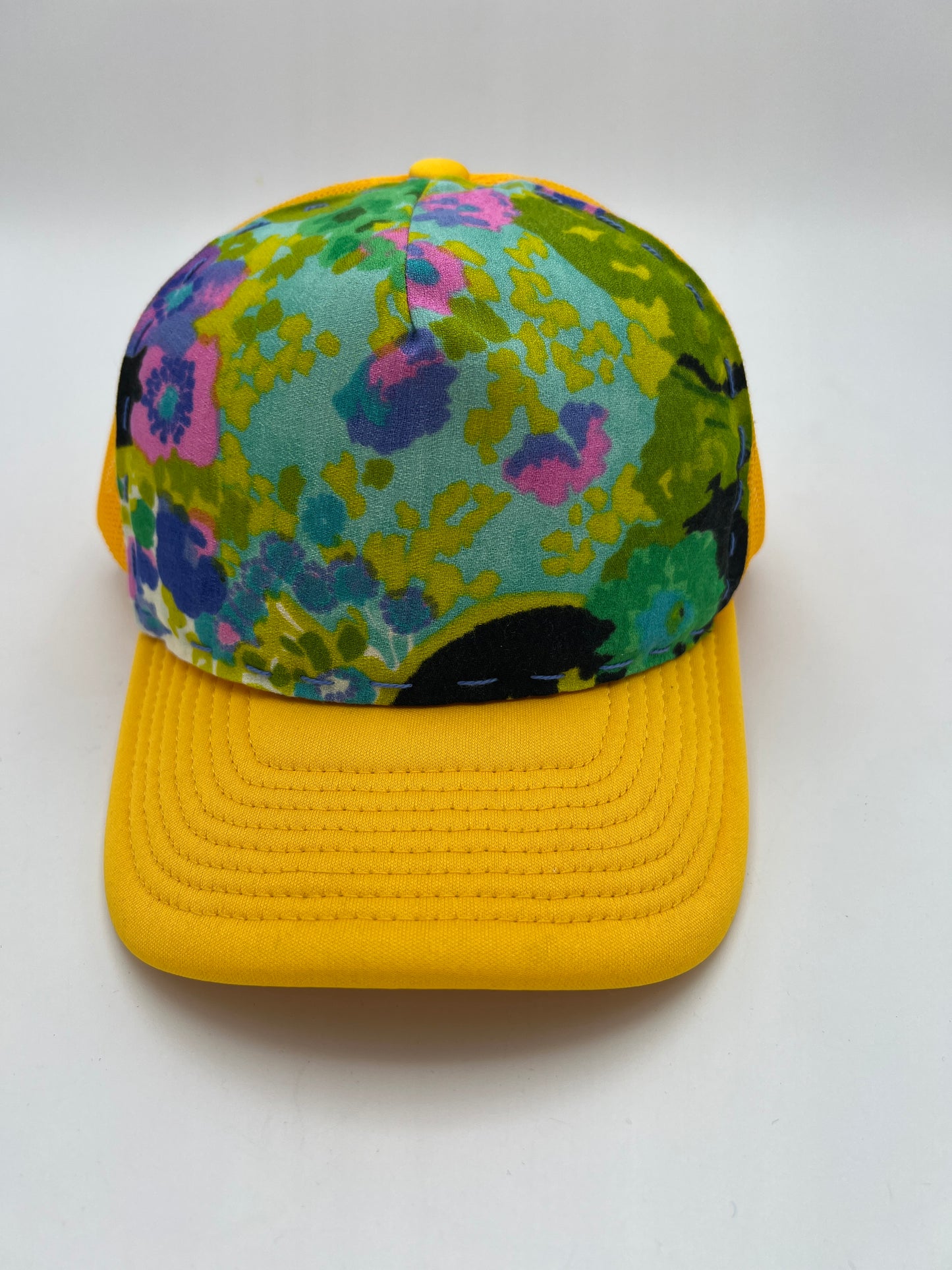 Vibrant vintage floral 60s fabric, curved brim trucker hat-goldenrod