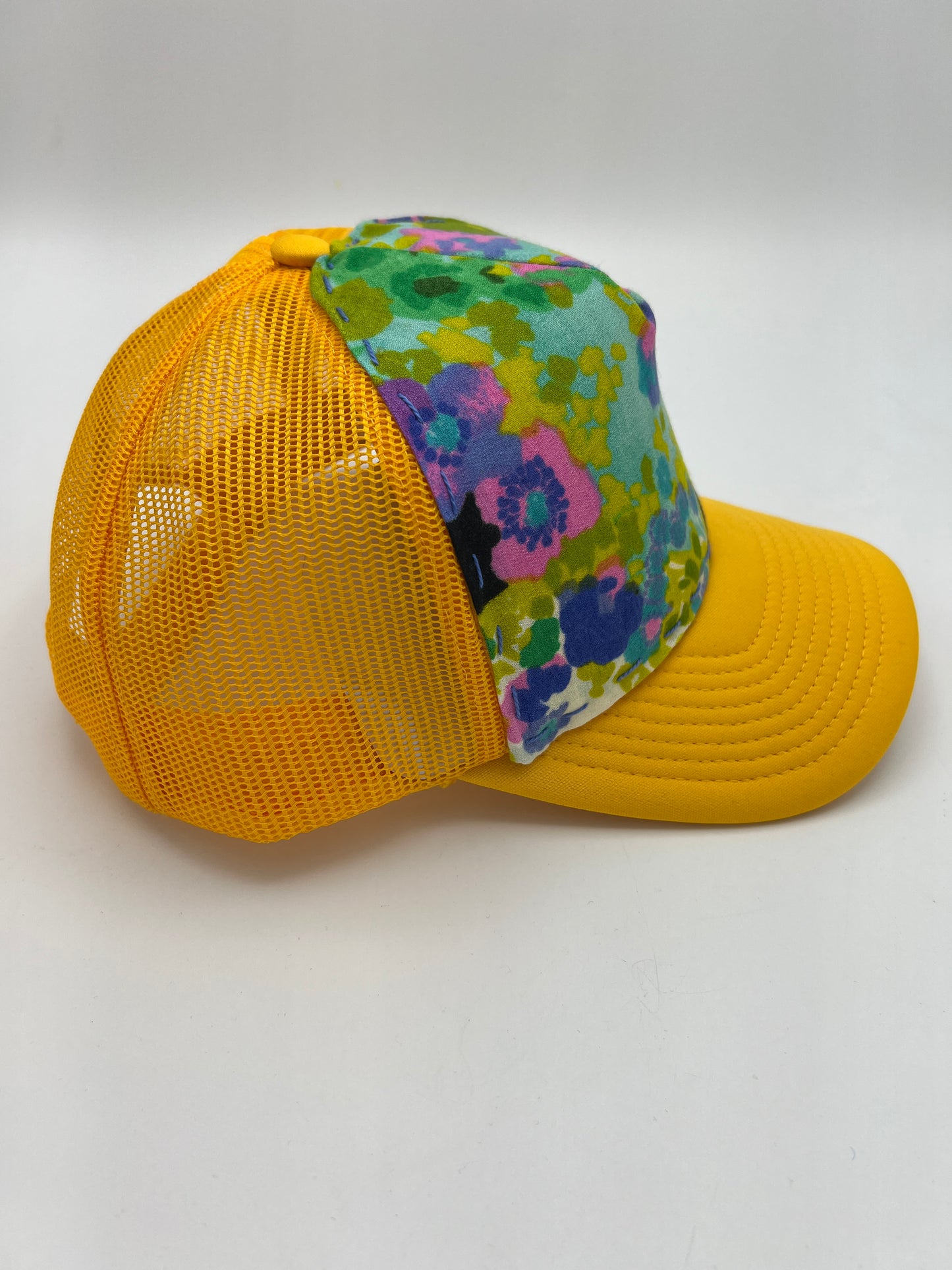Vibrant vintage floral 60s fabric, curved brim trucker hat-goldenrod