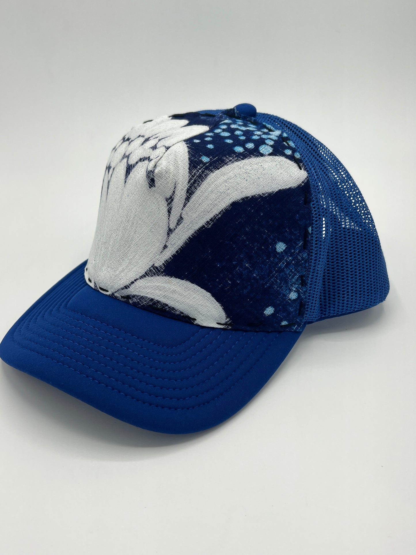 Vibrant vintage barkcloth floral fabric- curved brim blue trucker hat