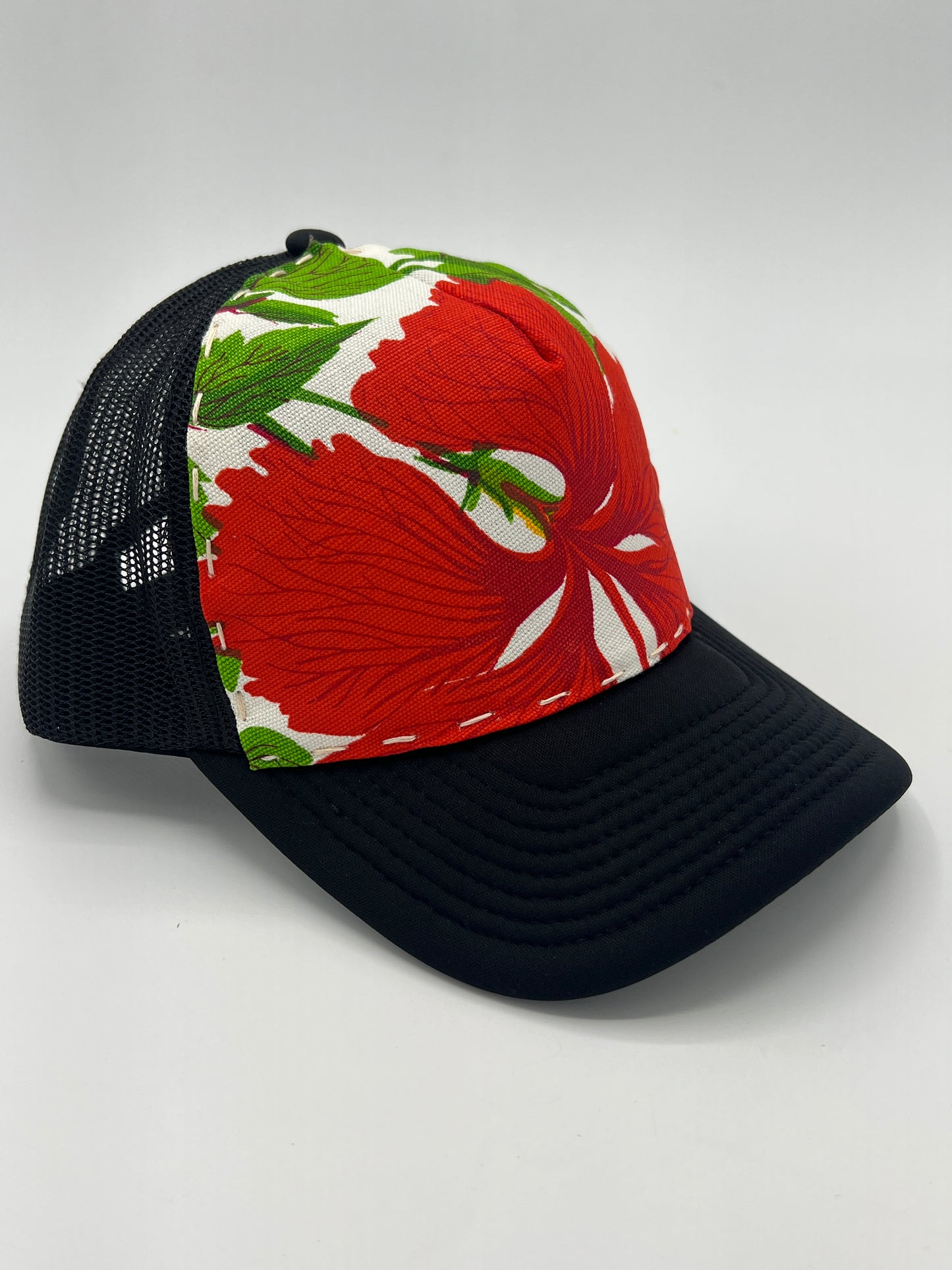 Bagshaws of Saint Lucia vibrant vintage fabric- black curved brim trucker hat